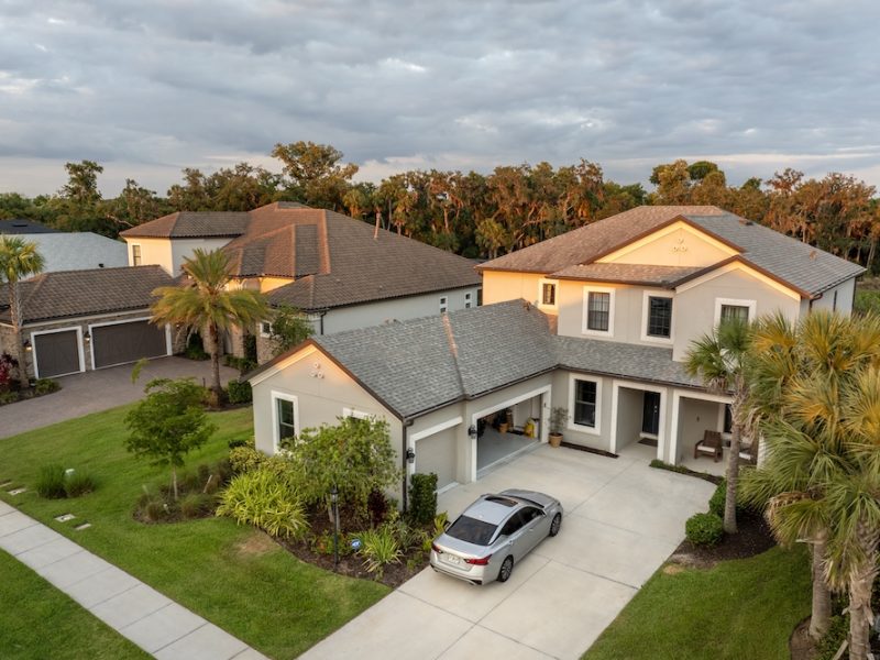Aerial view of expensive residential houses in small town in southwest Florida. American dream homes as example of real estate development in US suburbs.
